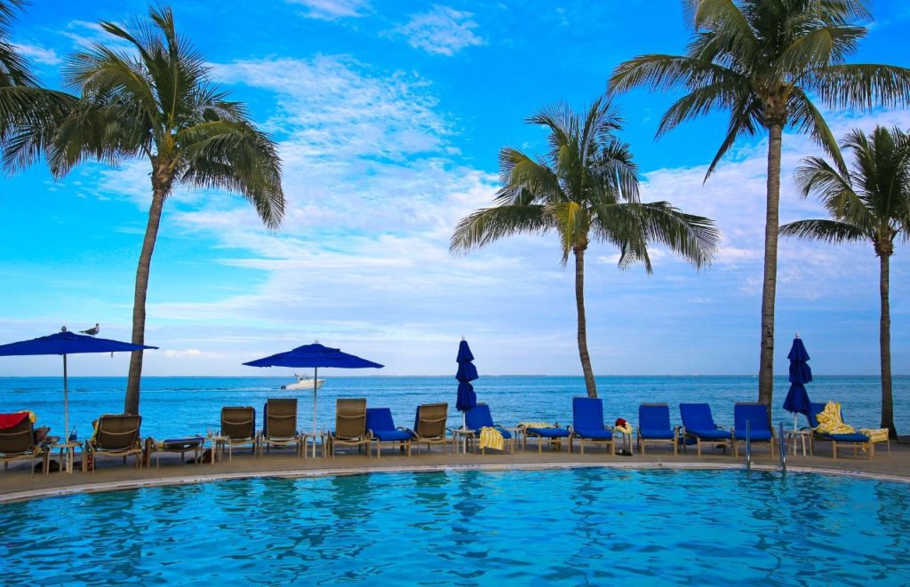 Fort Myers Beach Resort Infinity pool off Gulf of Mexico in Florida Canva. Keep reading to find out more about the best Florida beaches in August.