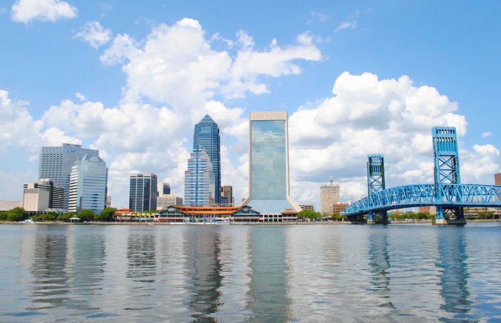 A daytime view of the Jacksonville, Florida skyline. Keep reading for more places to take a perfect day trip from Orlando, Florida. 