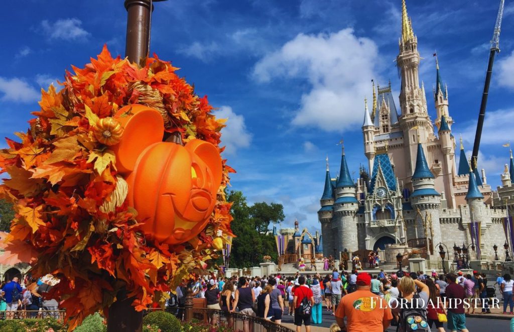 Mickey Mouse Pumpkin head in front of Cinderella Castle