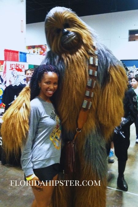 NikkyJ with Chewbauca at Tampa Bay Comic Con. Keep reading learn about what to pack for Florida and how to create the best Florida Packing List 