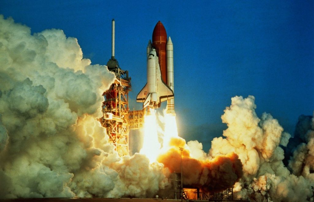 A space shuttle launch at Space at Kennedy Space Center in Cape Canaveral, Florida. Keep reading for more places to take a perfect day trip from Orlando, Florida. 