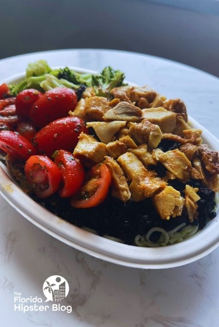 Bolay Broccoli chicken tomato and black rice