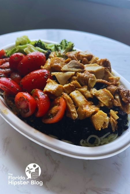 Bolay Broccoli chicken tomato and black rice. Keep reading to get the best lunch in Tampa, Florida recommendations.