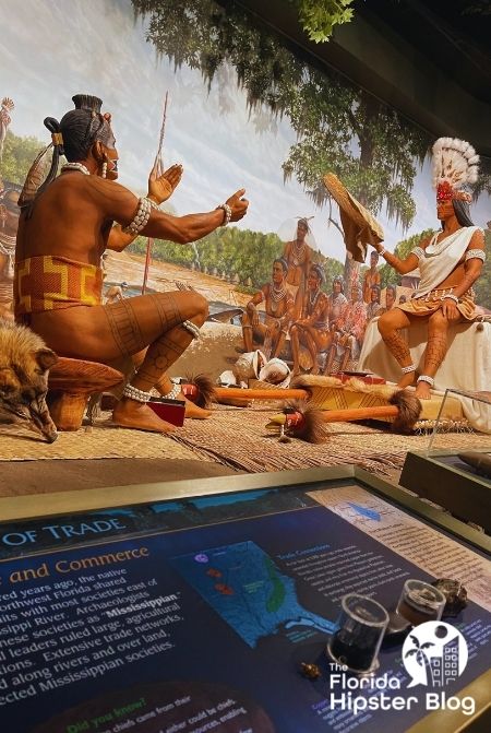 Florida Seminoles trading at the Florida Museum of Natural History Gainesville.  Keep reading to learn more about the best hotels in Gainesville.