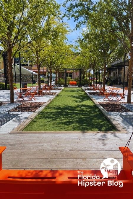 Orange swing at Gainesville Celebration Pointe. Keep reading to discover more free things to do in Gainesville.