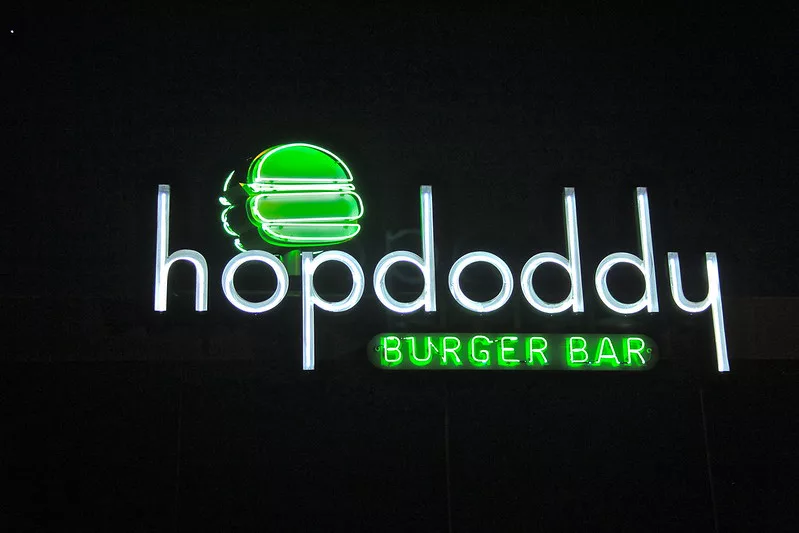 Hopdoddy Burger Bar Neon Sign making it one of the best burger in Gainesville.