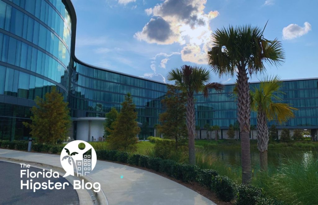 Design of exterior of  Hotel Eleo lined with windows overlooking a pond. Gainesville Florida. Keep reading to discover the best hotels in Gainesville.