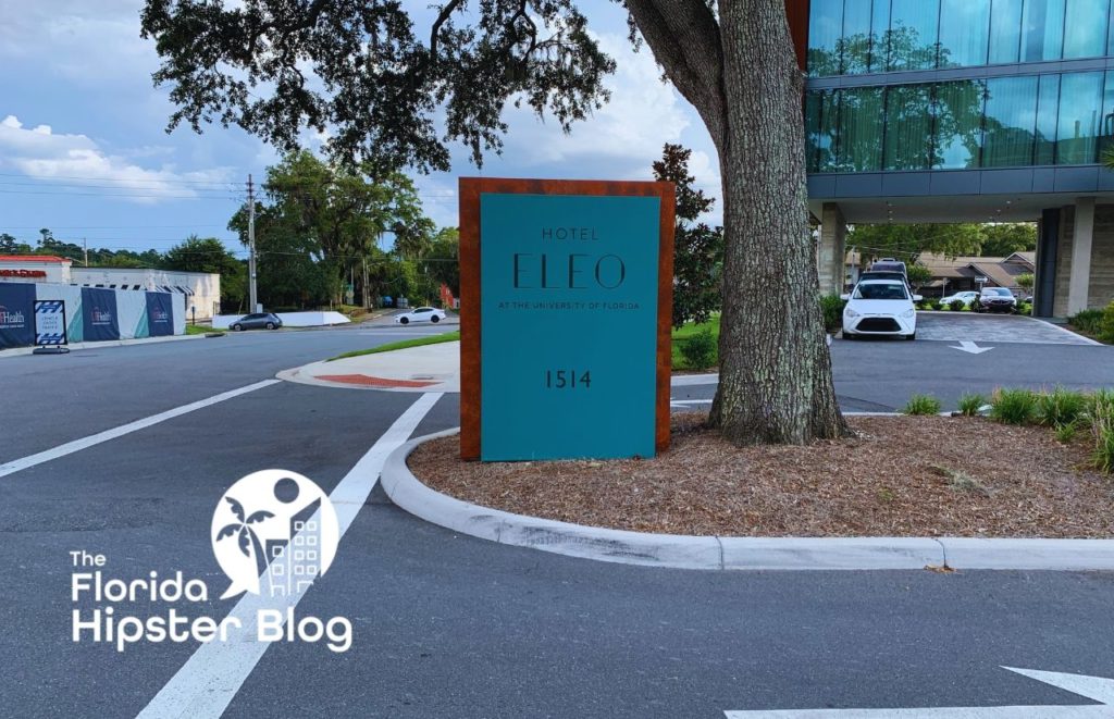 Hotel Eleo entrance sign Gainesville Florida. Keep reading to learn more about Gainesville bars.