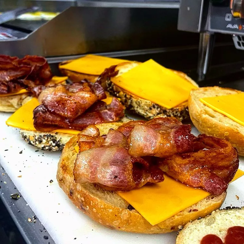 Luke's New York Bagel Shop with huge bagel sandwiches with cheese slices and crispy bacon. Keep reading to find out more about the best Gainesville breakfast places. 