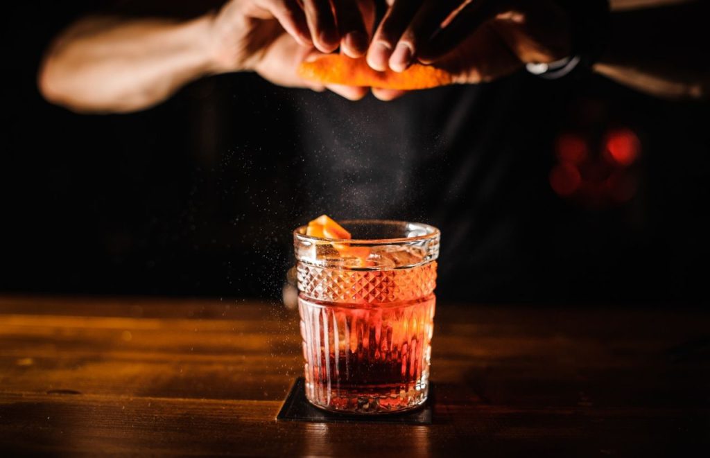 Bartender making a drink. Keep reading to discover more ideas for a couples night in Orlando.