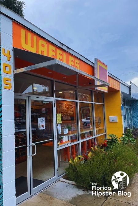 Orange retro exterior of Square House Pizza Gainesville Florida. Keep reading to find out more about the best restaurants in Gainesville with outdoor seating.