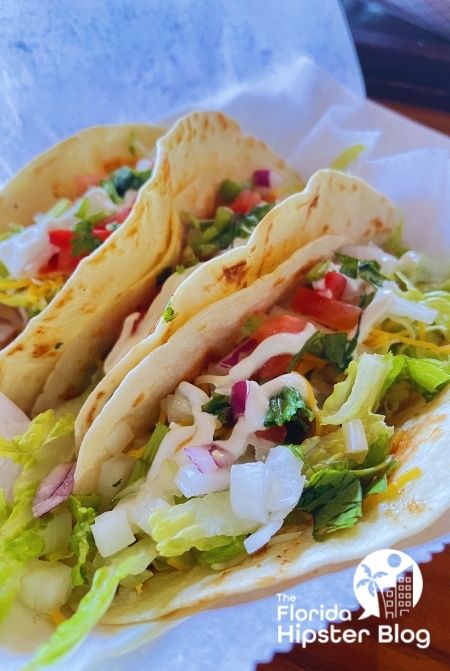 Tacos filled with toppings wrapped up to go. Keep reading to find out all you need to know about the best Jacksonville festivals. 