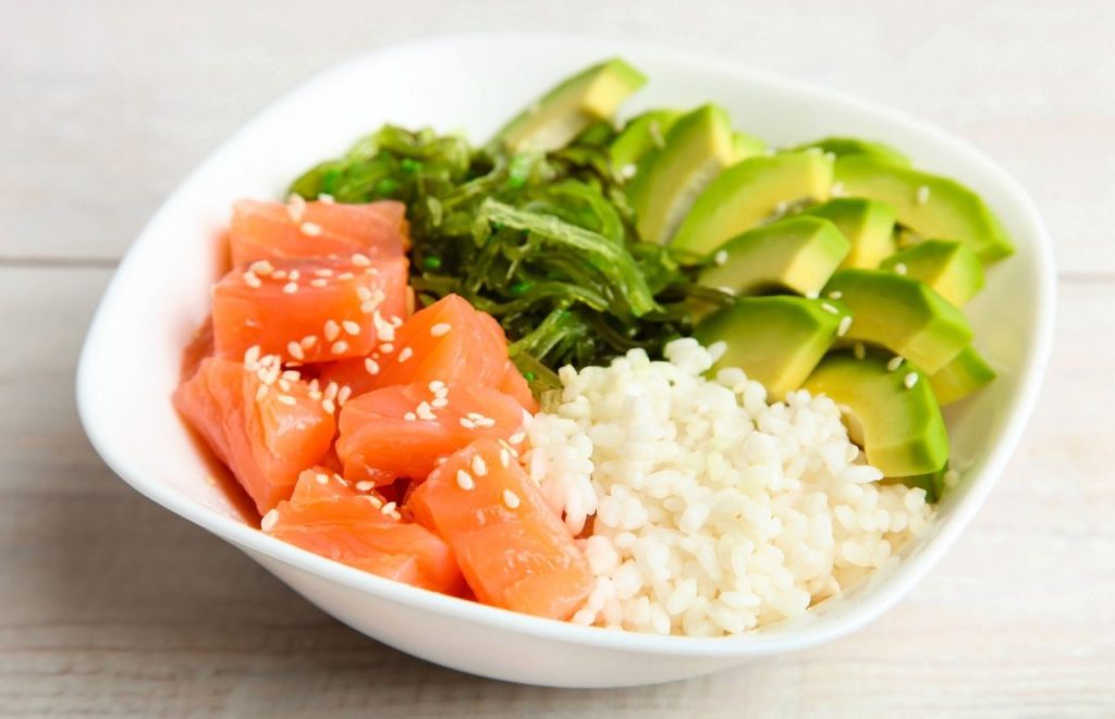 Salmon avocado and rice poke bowl. Keep reading to discover where to find the best lunch in Gainesville.