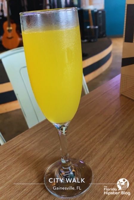 Mimosa at The Keys Grill and Piano Bar Celebration Pointe , one of the Best Brunch in Gainesville. Keep reading to find out all you need to know about the best brunch in Gainesville. 