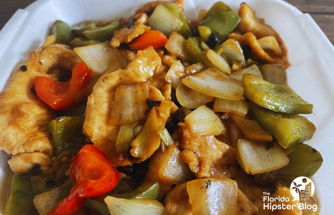 Yummy House Chicken in Black Bean Sauce with sautéed red and green peppers. Keep reading to see what are the best places to get lunch in Orlando.