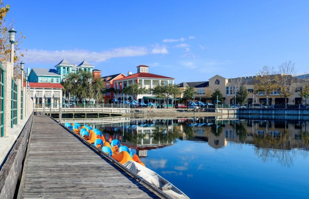 Celebration Florida Downtown Square near lake. Keep reading to find out all you need to know about the best things to do for Independence Day in Florida.    