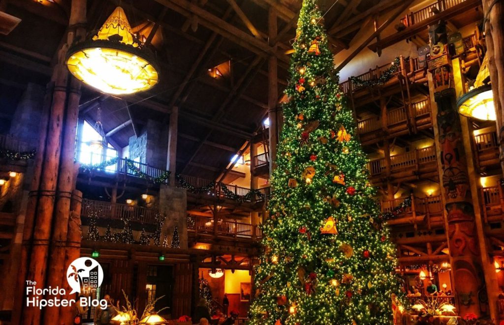 Christmas tree in Disney Wilderness Lodge Lobby. Keep reading to discover more Christmas in Orlando events.