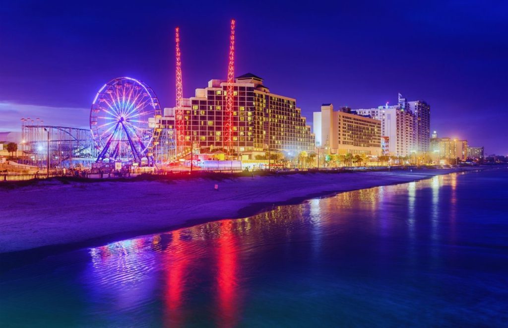 Daytona Beach Front Skyline at Nights. Keep reading to get the best beaches in florida for bachelorette party.