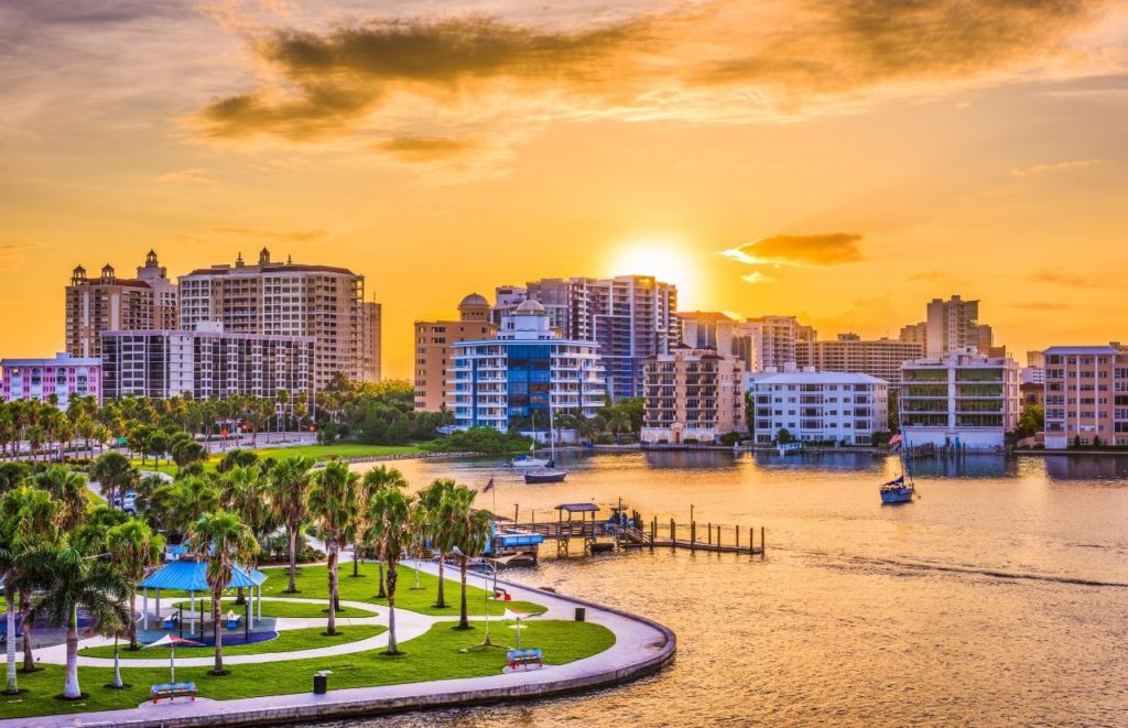 Sarasota Florida USA Downtown Skyline with Bay Area Holidays on the Green. Keep reading to find out all you need to know about the best things to do for 4th of July in Florida.  