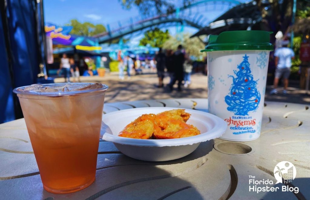 SeaWorld Orlando Christmas Celebration Food Holiday Mint Margarita with Spicy Shrimp and Hot Cocoa. One of the best things to do in Orlando at Christmas.