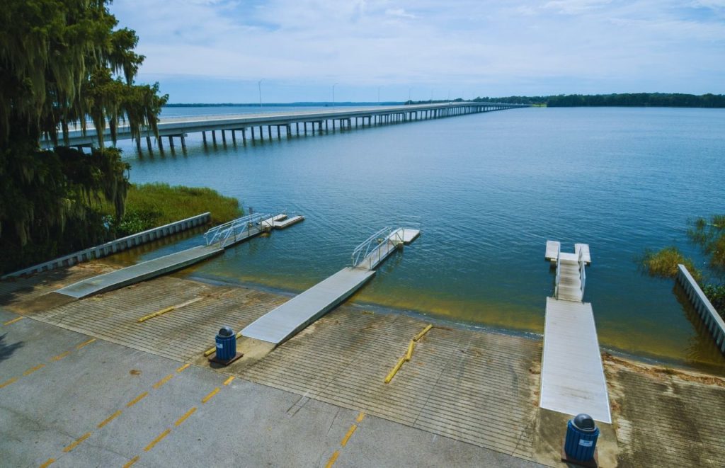 Tavares Florida Lake Harris Boat Dock. One of the best things to do in Orlando at Christmas. Keep reading to discover more Christmas in Orlando events.