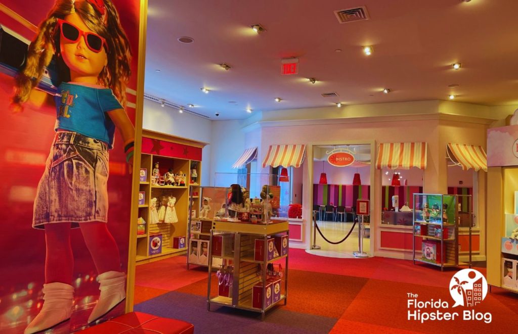 Doll house room design with larger than life poster of American Girl at the American Girl Bistro Cafe Orlando Florida. Keep reading to discover the kid friendly restaurants in Orlando.