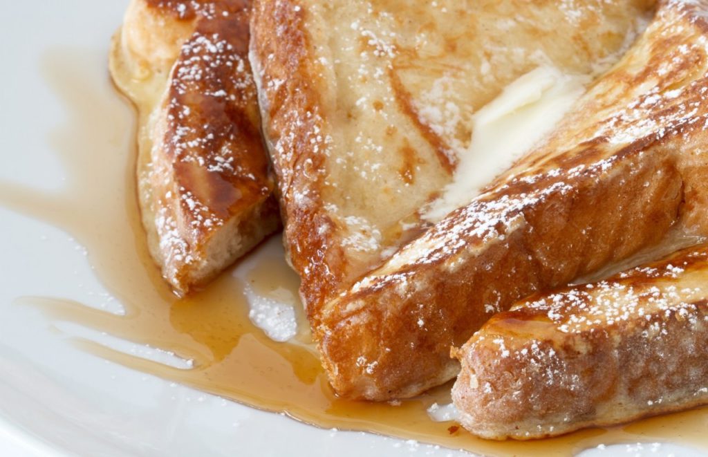 French toast drizzled in syrup. Keep reading to get the full guide on the best breakfast spots in Orlando.