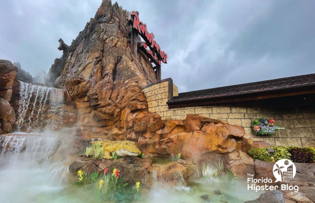 Rainforest Cafe Entrance at Disney Springs. Keep reading to get the best rain ponchos for travel to Florida.