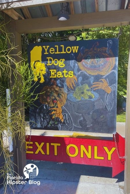 Yellow Dog Eats Exit Sign in Orlando Florida. Keep reading to find out the best kid restaurants in Orlando. 