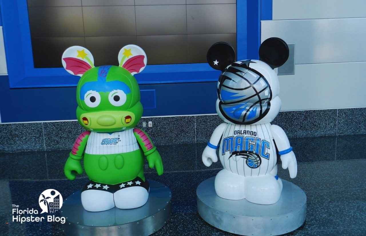 Amway Arena with Stuff and Mickey Mouse Figures Orlando Magic. Keep reading to learn more about the best things to do in Orlando for couples.