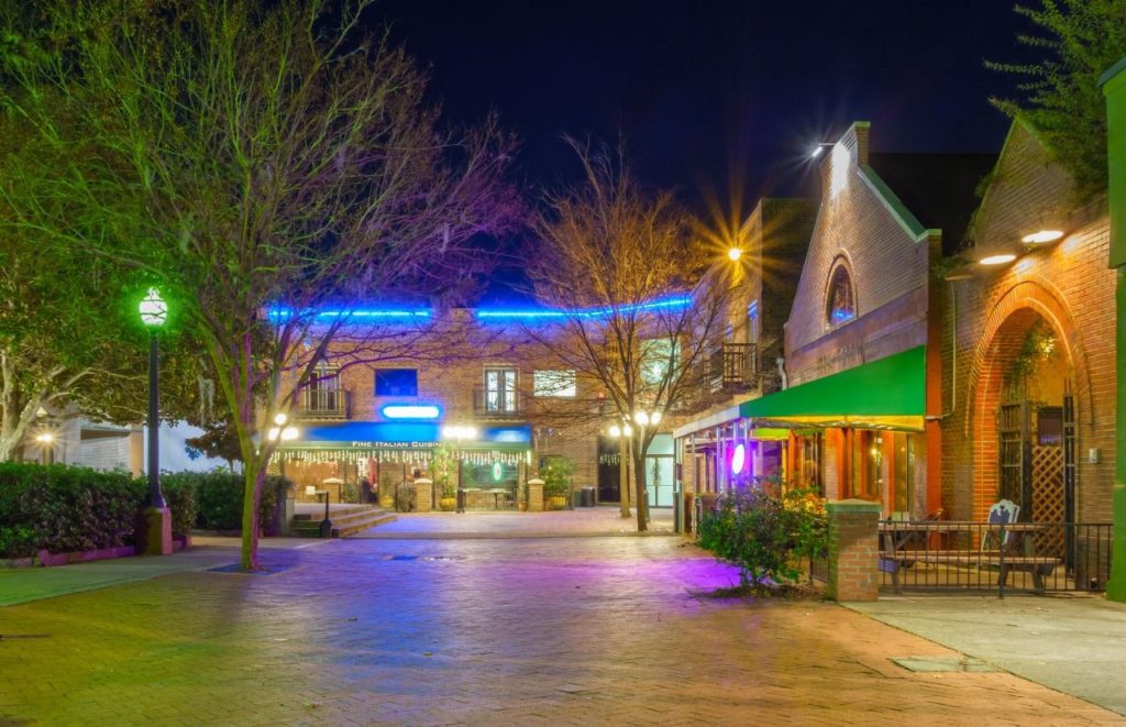 Bo Diddley Plaza Downtown Gainesville Florida with glowing colorful lights. Keep reading to learn the top things to do in Gainesville.