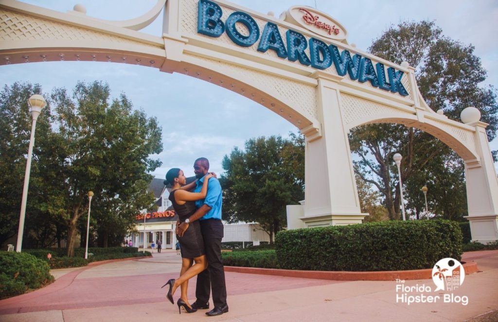 Couple at Boardwalk Disney in Orlando Florida. Keep reading for more romantic getaways in Orlando.