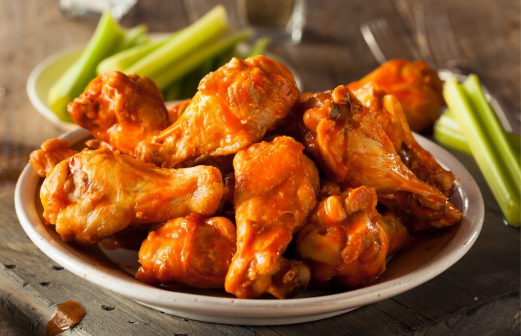 Bowl of wings and sauce. Keep reading to find out the best brunch in Gainesville.
