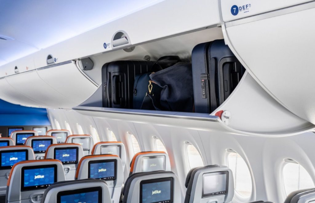 JetBlue Overhead Bin for carry-on luggage. Keep reading to discover JetBlue’s carry-on bag size limit. 