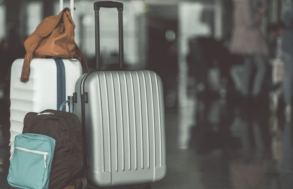 Luggage inside the airport. Keep reading to find out all you need to know about flying JetBlue with a carry-on.