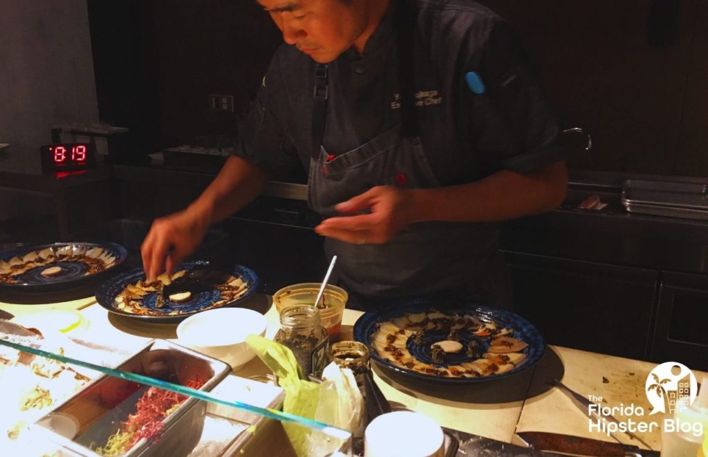 Morimoto Asia in Orlando Sushi Chef creating Masterpiece. Keep reading to learn more about sushi in Orlando. 