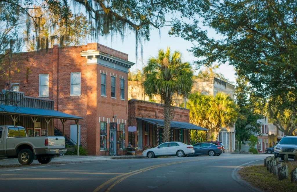 Shop for Antiques in Micanopy with a tree lined charming street. Keep reading to uncover the best things to do when visiting Gainesville. 