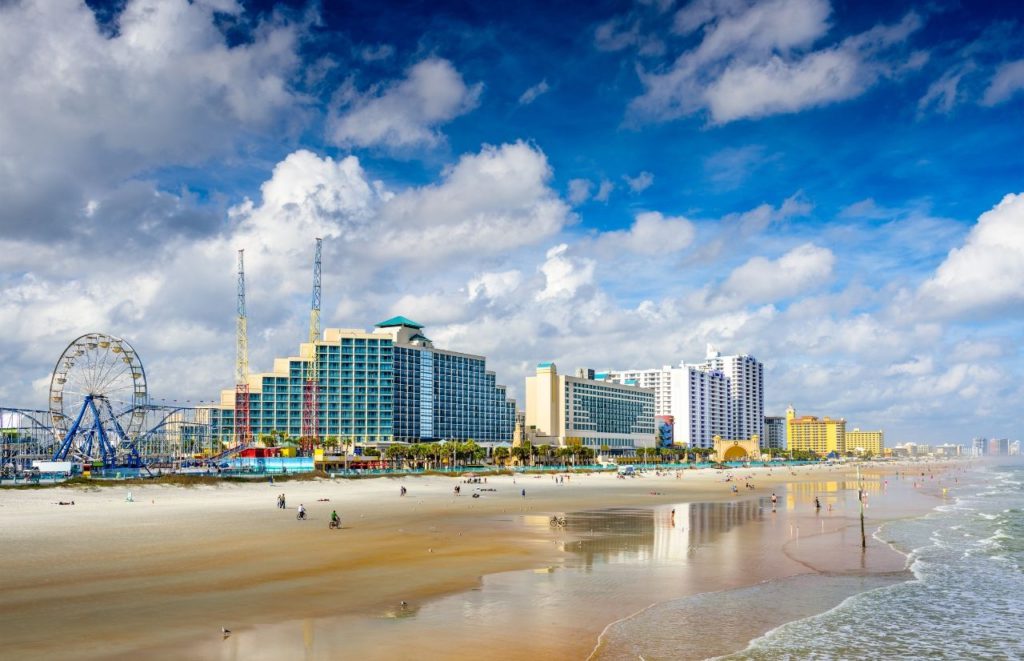 The Daytona Beach skyline with the Ferris Wheel in Daytona Beach, Florida. Keep reading for more places to take a perfect day trip from Orlando, Florida. 