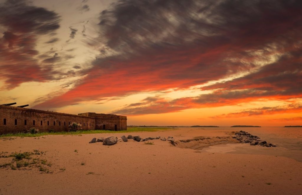 A sunset view of the beach at  Fort Clinch State Park near Amelia Island in Florida. Keep reading for more places to take a perfect day trip from Orlando, Florida. 