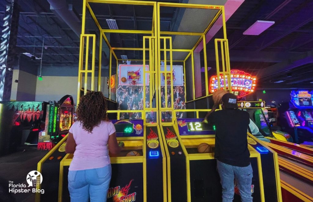Dave & Buster's Jacksonville Basketball Game with black woman and black man. Keep reading for the full guide to Jacksonville nightlife and things to do tonight 