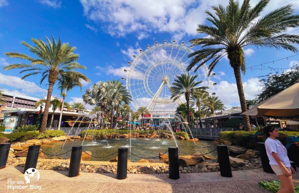 Icon Park fountain and Ferris wheel in Orlando Florida. Keep reading for more romantic getaways in Orlando.