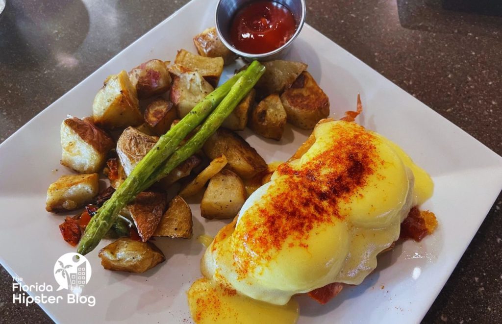 Eggs Benedict at Island Grove Winery at Formosa Gardens in Kissimmee, Florida. Keep reading for more places to get the best breakfast in Kissimmee, Florida. 