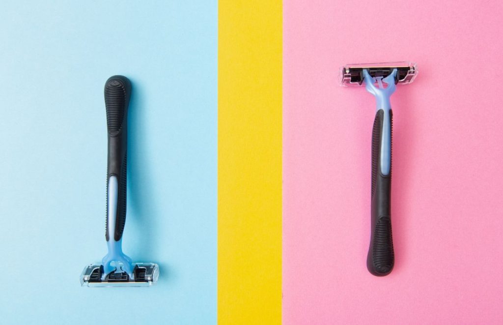 Can carry-on a shaving razors on blue, yellow, and pink background