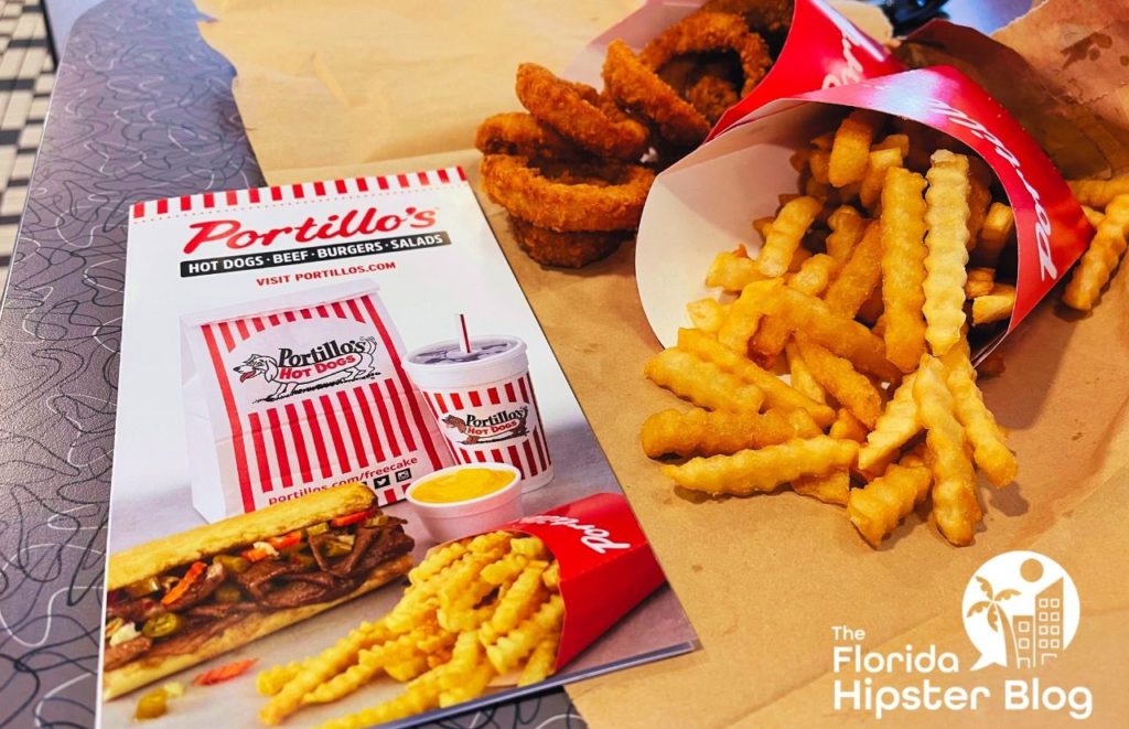 Portillo’s Burgers Orlando fries and onion rings. Keep reading to learn about the best burger in Orlando.
