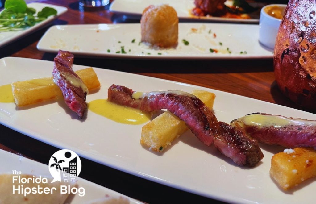 STK Orlando Steak STrips. Keep reading to find out what is the most romantic getaway in Florida for couples.