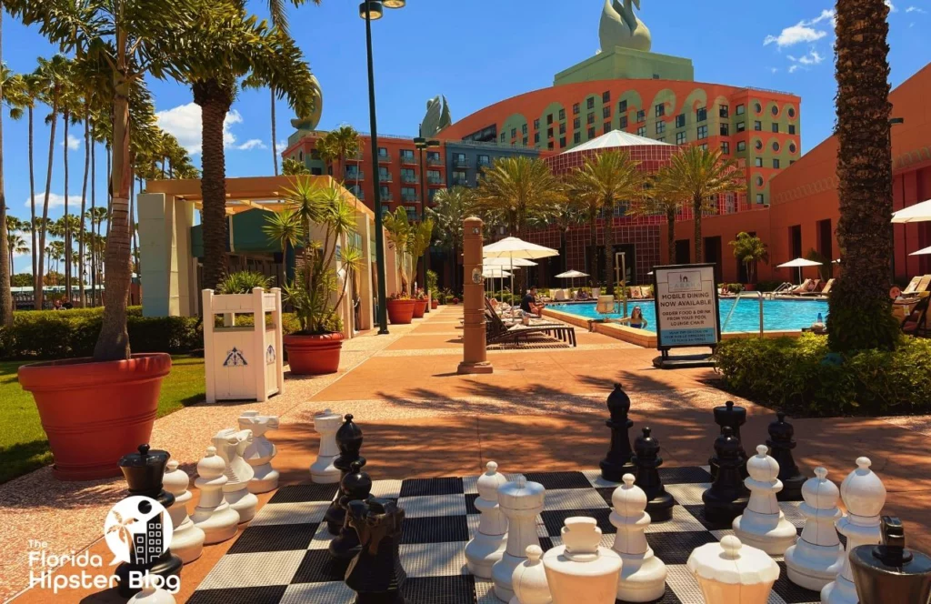 Disney Swan and Dolphin Resort Hotel in Orlando, Florida Pool Area with Large Chess Game. Keep reading learn about what to pack for Florida and how to create the best Florida Packing List 