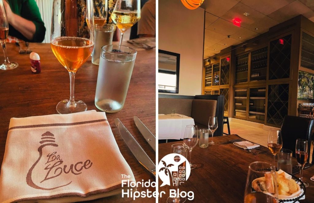 Cloth napkins and a glass of wine sit on a table at La Luce at Signia by Hilton Orlando Bonnet Creek in Orlando, Florida. Keep reading for more on the best restaurants in Orlando, Florida. 