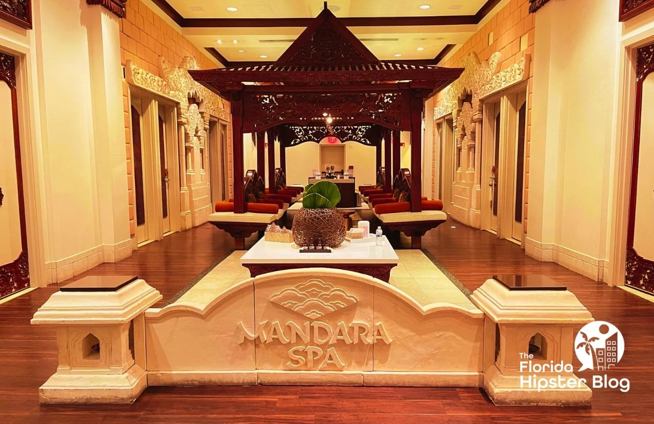 The lobby of the Mandara Spa at the Walt Disney Swan and Dolphin Resort features wood floors and deep brown wood accents. Keep reading for more options for where to stay in Orlando Florida.