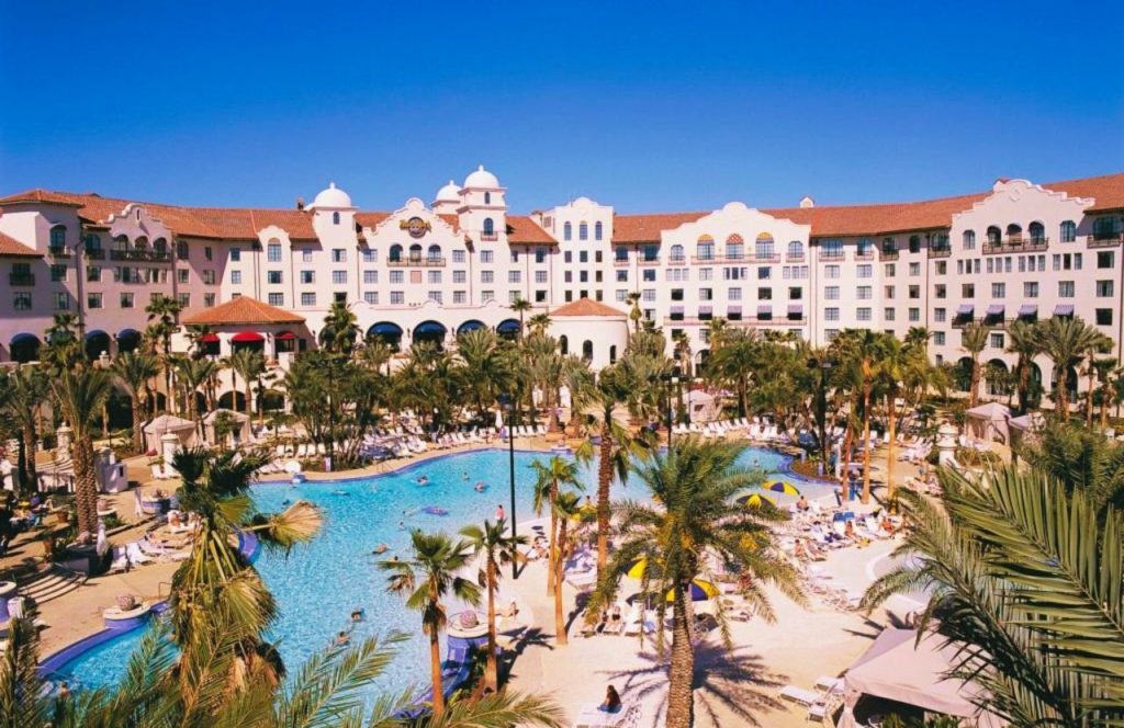 The pool area is surrounded by palm trees and sits at the center of the Universal Orlando Hard Rock Hotel in Orlando, Florida. Keep reading for more options for where to stay in Orlando, Florida.