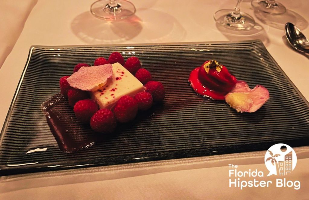 Bull and Bear raspberry dessert at Waldorf Astoria Orlando. Keep reading to learn more about the Epicurious progressive dinner.